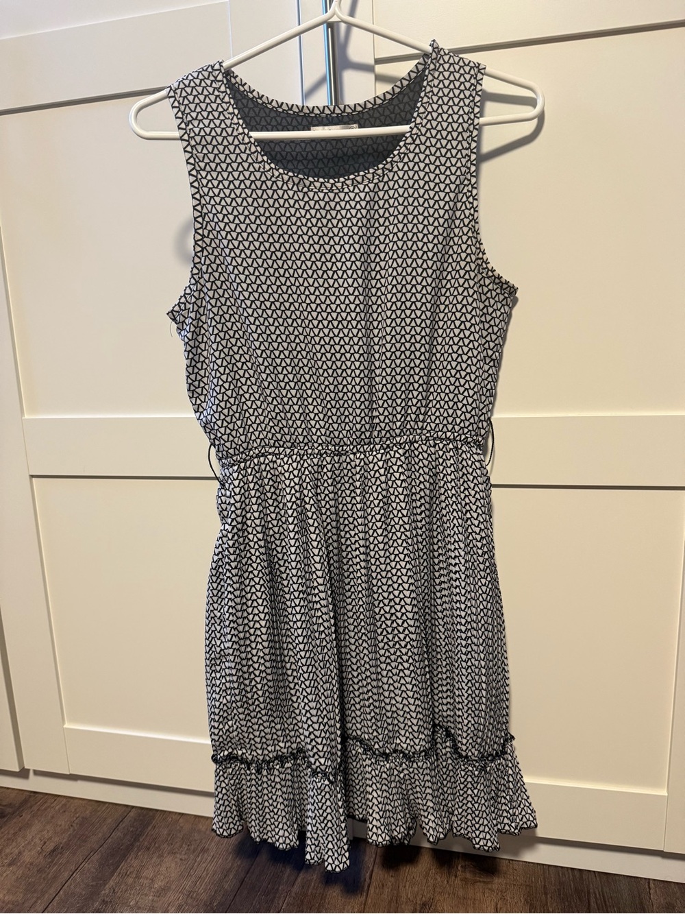 Sleeveless Black & White Geometric Midi Dress with Ruffle Hem